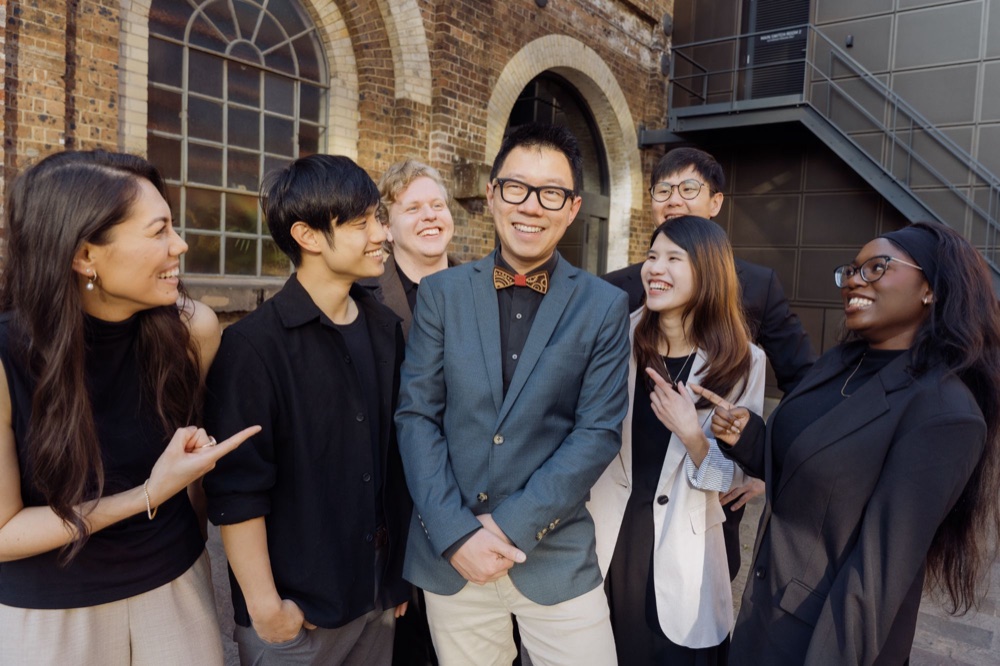 The Salt Shaker Films team laughing together around Frankie